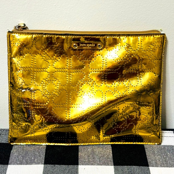 kate spade Handbags - Kate Spade Shimmering Gold Cosmetic Case Retired